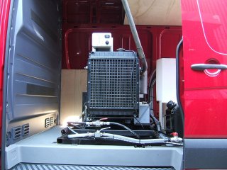 Van mounted pressure washer side view