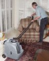 Cleaning armchair using CFR35 with hose 